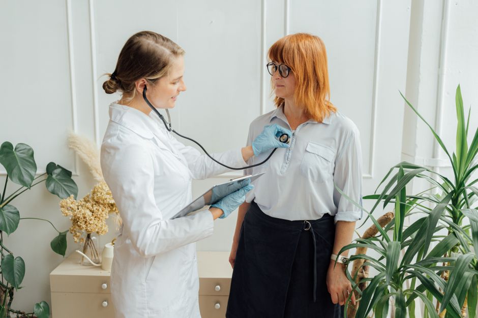 doctor-examining-patient-clinic